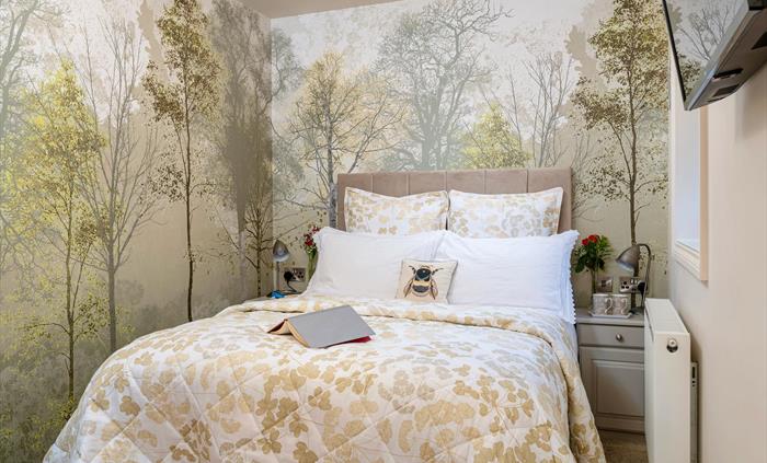Garden Double Lily with ensuite walk in wall and rain shower with private entrance and out door seating with views over the wild bird feeders - great